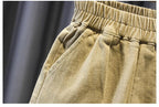 Conjunto niño 3 piezas: chaqueta negra, camiseta de rayas y pantalón beige | ropa niño elegante en España