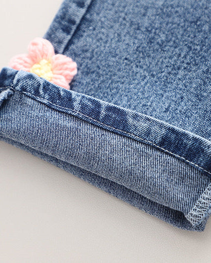 Conjunto niña 3 piezas rosa: suéter, camiseta arcoíris y pantalón vaquero con flores crochet en España