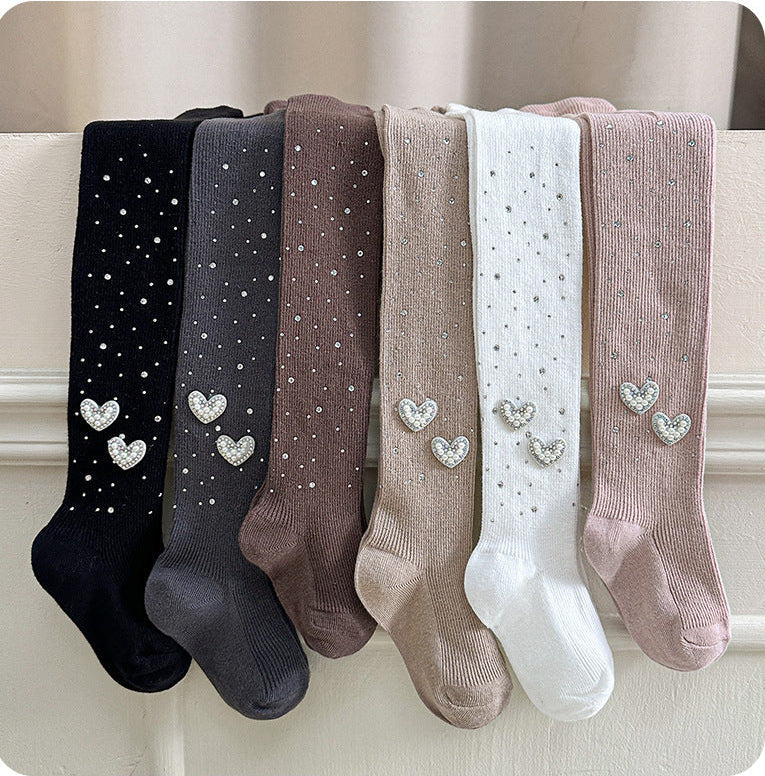 Girls' heart-embellished tights in black, gray, brown, beige, white, and pink with sparkly dots