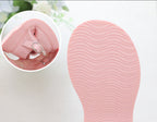 Zapato para niña con diseño de moño adornado con perlas en España