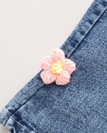 Conjunto niña 3 piezas rosa: suéter, camiseta arcoíris y pantalón vaquero con flores crochet en España