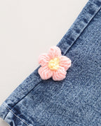 Conjunto niña 3 piezas rosa: suéter, camiseta arcoíris y pantalón vaquero con flores crochet en España