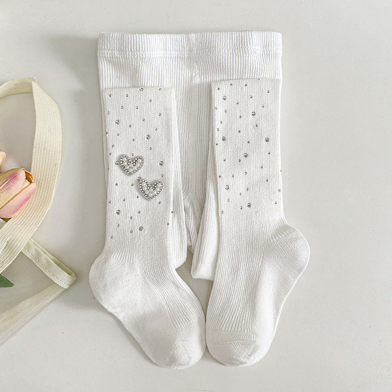 White kids' socks with rhinestone hearts and dots, soft ribbed knit for comfort and style