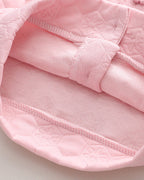 Conjunto niña 3 piezas rosa: suéter, camiseta arcoíris y pantalón vaquero con flores crochet en España