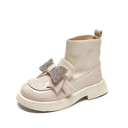 Zapato de niña de lujo con diseño elegante, decorado con un lazo adornado con cristales en España