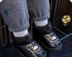 Zapato de invierno con diseño de oso en España