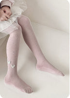 Pink ribbed kids tights with heart embellishments, perfect for toddler fashion and comfort.