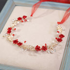 Diadema para el cabello con diseño de flores y perlas