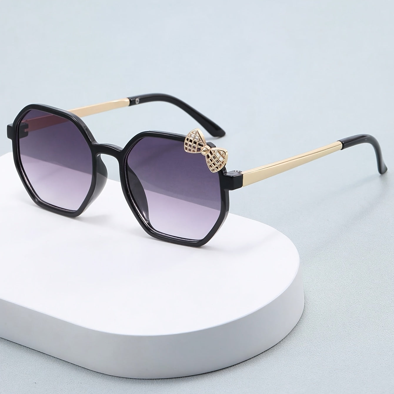 Gafas de sol para niñas con montura metálica y decoradas con un lazo 🎀