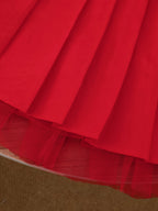 Conjunto de 2 piezas: falda de tul roja y camiseta con estampado de corazones.