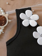 Conjunto de niña con top de espalda cruzada y shorts con flores 3D