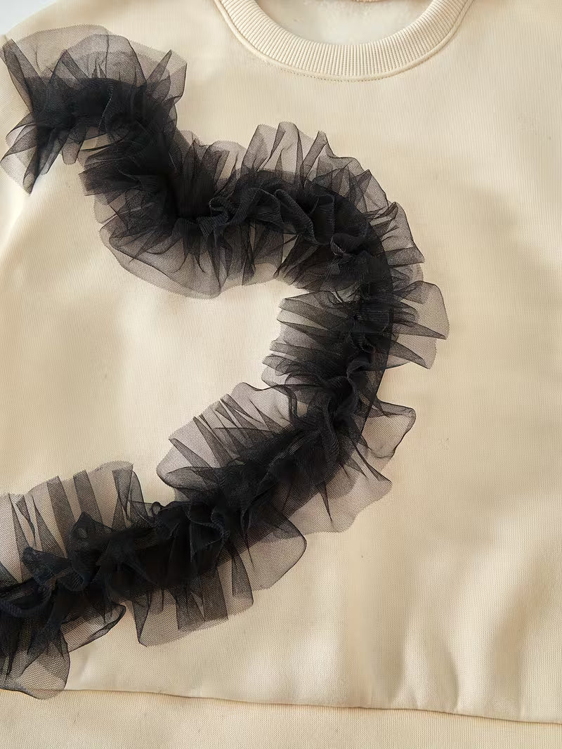 El conjunto de tul y capas que redefine la elegancia infantil